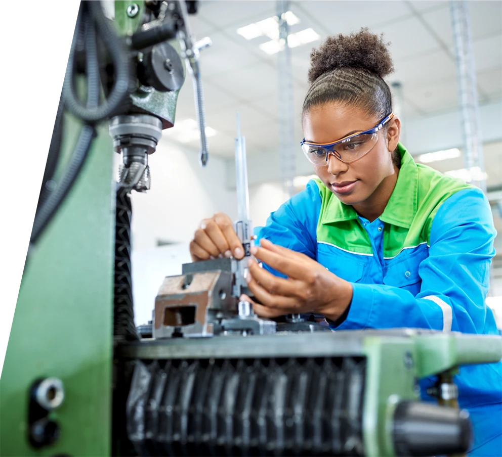 Worker calibrating a&nbsp;machine